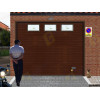Puerta de Garaje Seccional Acanalado LISO Madera Oscuro con Ventana
